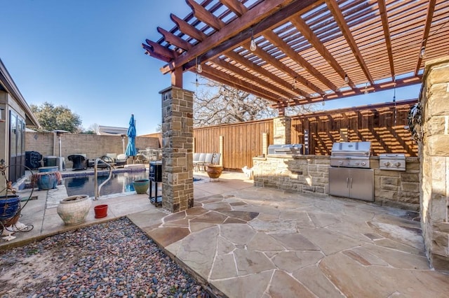 view of patio with a fenced in pool, grilling area, a pergola, and exterior kitchen