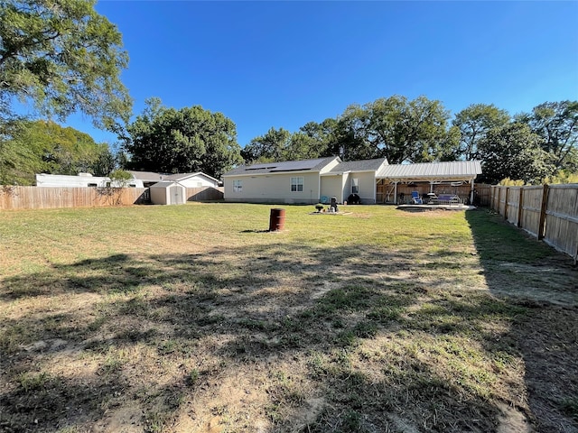 view of yard with a storage shed