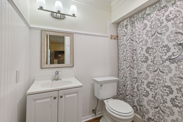 bathroom with ornamental molding, vanity, toilet, and a shower with shower curtain