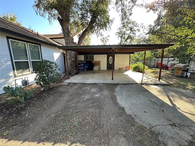 view of car parking featuring a carport