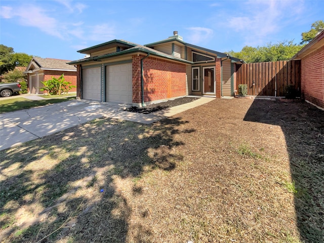 view of front of property featuring a garage