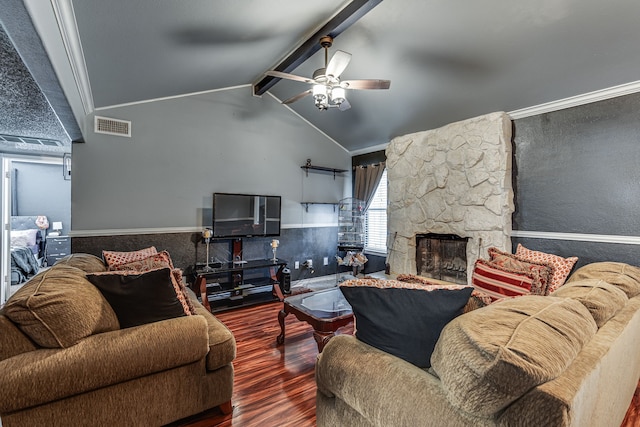 living room featuring ceiling fan, a fireplace, lofted ceiling with beams, and dark wood-type flooring