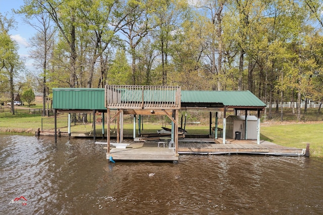 dock area with a water view