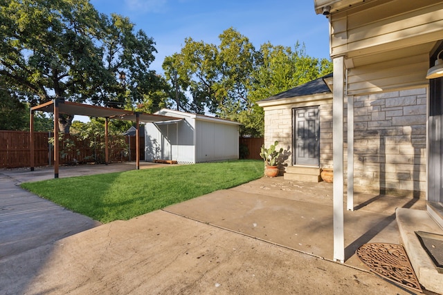 view of patio featuring a storage unit