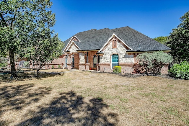 view of front of home with a front lawn