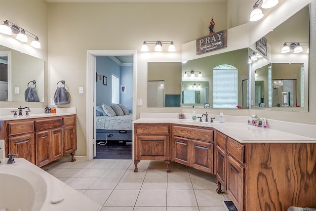 bathroom featuring tile patterned flooring and vanity