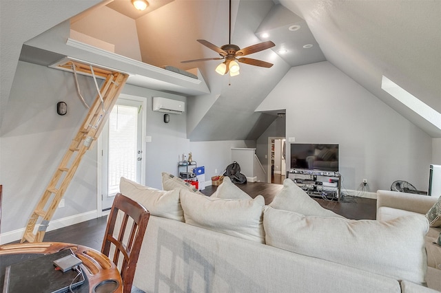 living room featuring ceiling fan, lofted ceiling with skylight, dark hardwood / wood-style flooring, and a wall unit AC