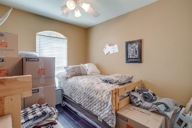 bedroom featuring hardwood / wood-style floors and ceiling fan