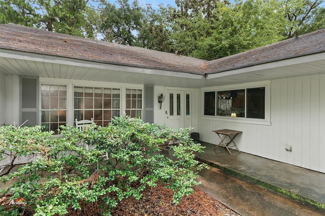 property entrance with a patio