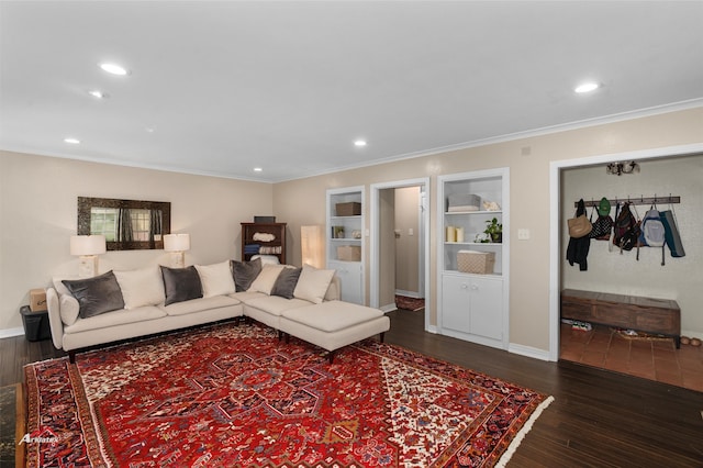 living room with crown molding and dark wood-type flooring