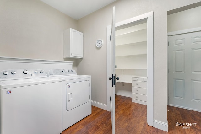 washroom featuring cabinets, dark hardwood / wood-style flooring, and independent washer and dryer