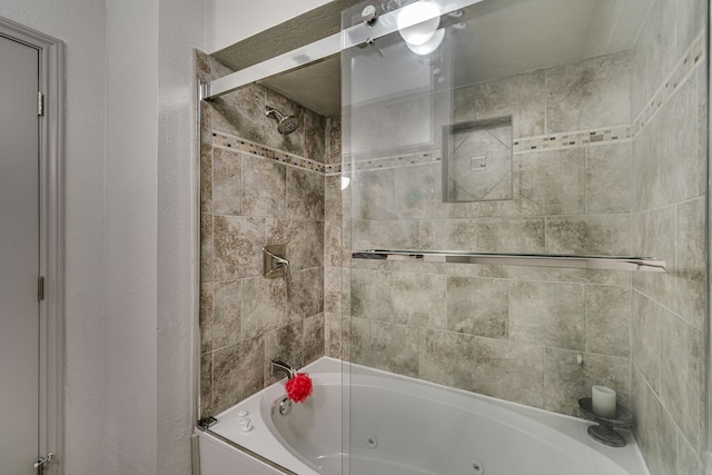 bathroom featuring tiled shower / bath combo