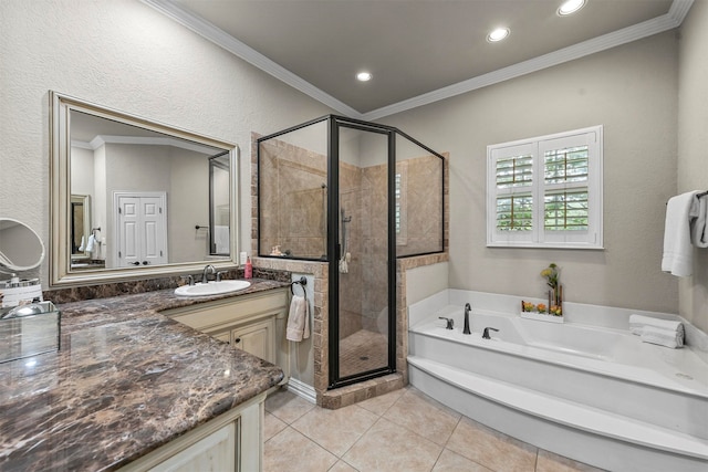 bathroom featuring tile patterned flooring, vanity, plus walk in shower, and ornamental molding