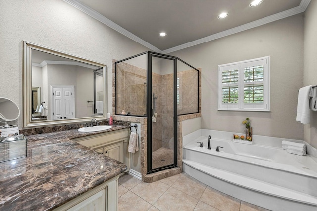 bathroom with ornamental molding, vanity, shower with separate bathtub, and tile patterned flooring