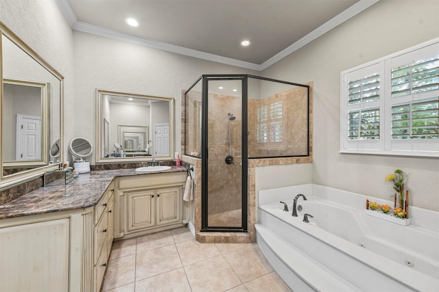 bathroom with vanity, crown molding, tile patterned floors, and plus walk in shower