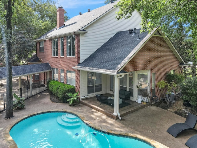 back of property with a patio area