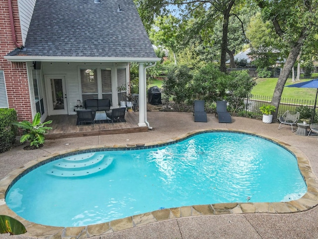 view of swimming pool with a patio area and outdoor lounge area