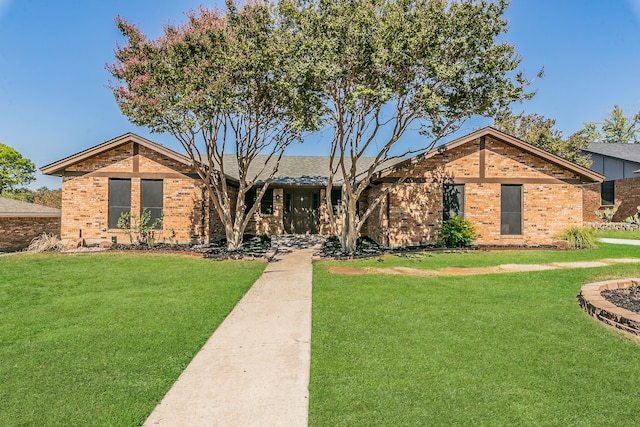 ranch-style home with a front yard