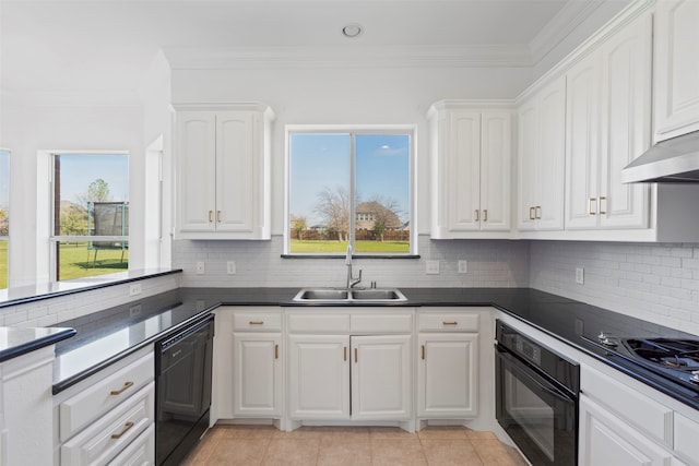 kitchen with backsplash, black appliances, sink, light tile patterned floors, and white cabinets