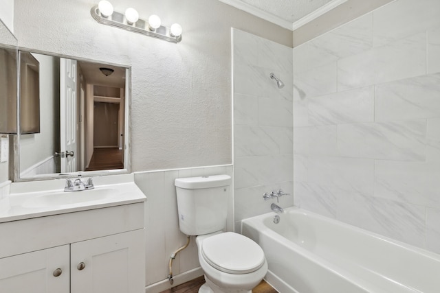 full bathroom with toilet, tiled shower / bath, crown molding, vanity, and a textured ceiling