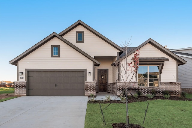 view of front facade with a front lawn and a garage