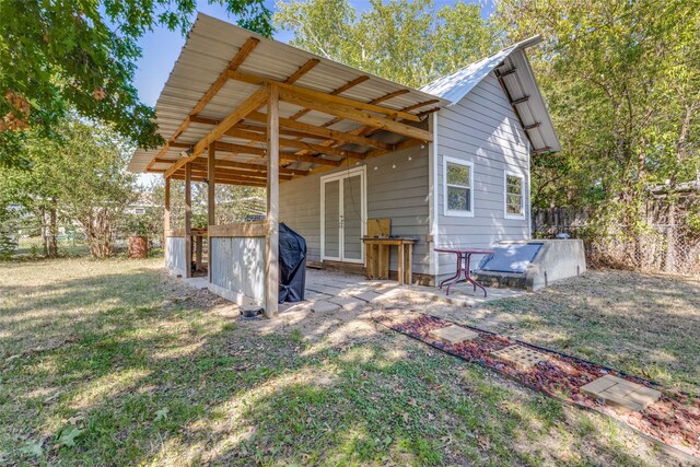 exterior space with a lawn