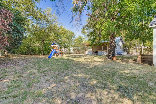 view of yard with a playground