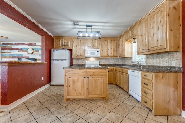 kitchen with backsplash, white appliances, a kitchen island, ornamental molding, and sink