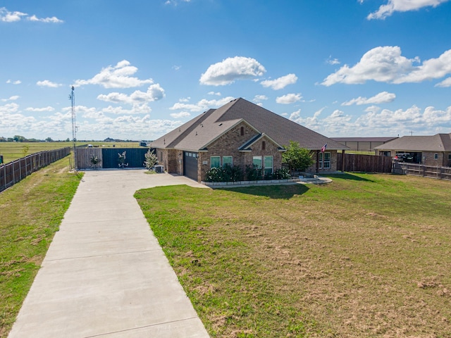 single story home featuring a front yard and a garage