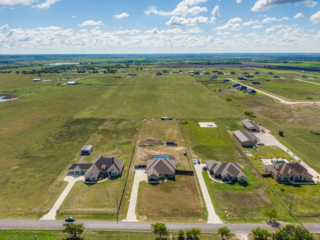 birds eye view of property featuring a rural view