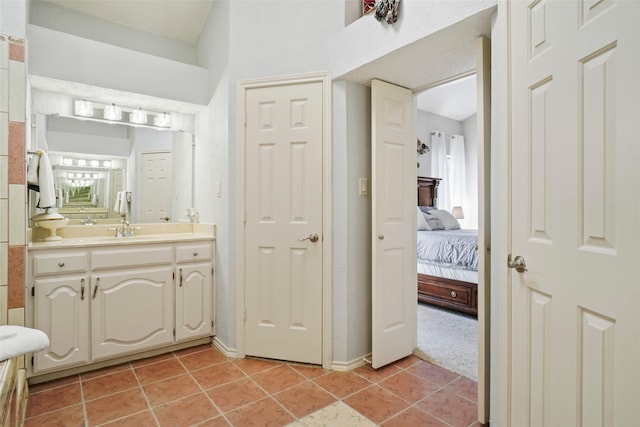 bathroom with vanity and tile patterned floors