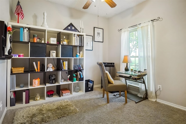 living area with ceiling fan and carpet floors