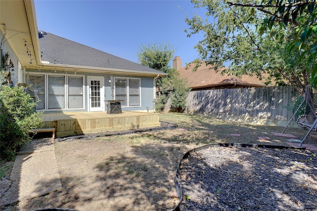 view of yard with a deck