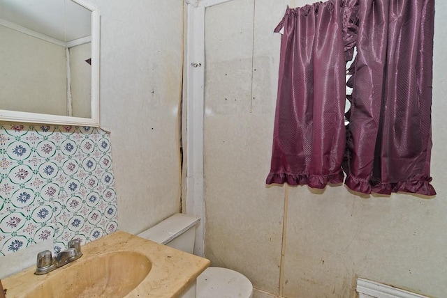 2223 Marburg St, Dallas, TX 75215 - half bathroom with vanity and toilet