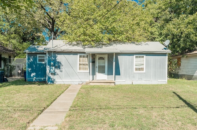 view of front of home with a front yard