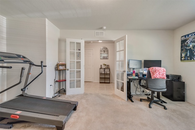 office featuring light colored carpet and french doors