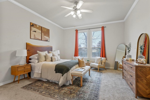 carpeted bedroom featuring crown molding and ceiling fan