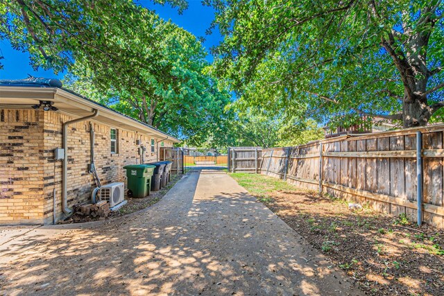 view of yard featuring a gate and fence