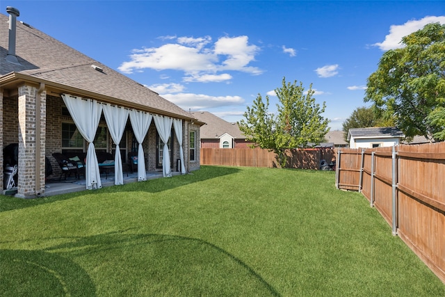 view of yard with a patio area