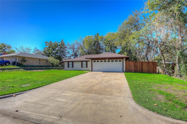 single story home with a front yard and a garage