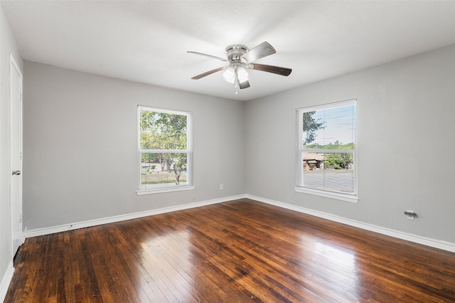 unfurnished room featuring ceiling fan and hardwood / wood-style floors