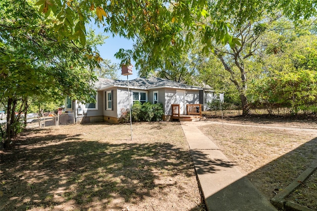 view of front of home with a wooden deck