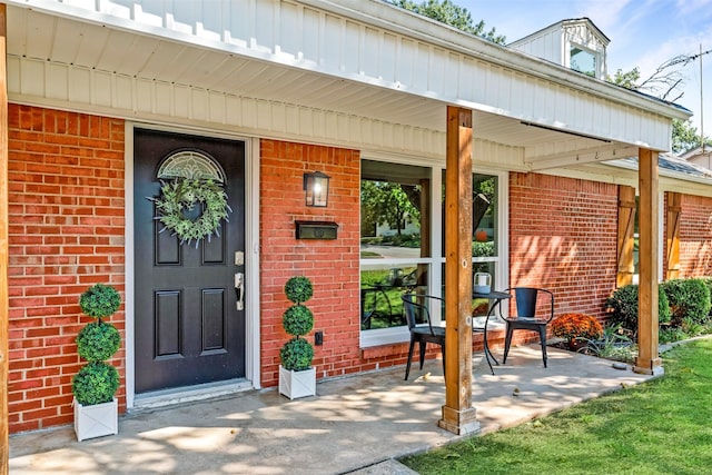 entrance to property with covered porch