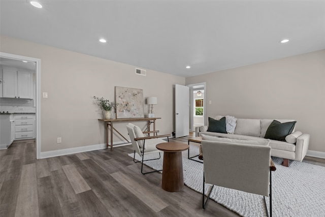 living room featuring dark hardwood / wood-style floors