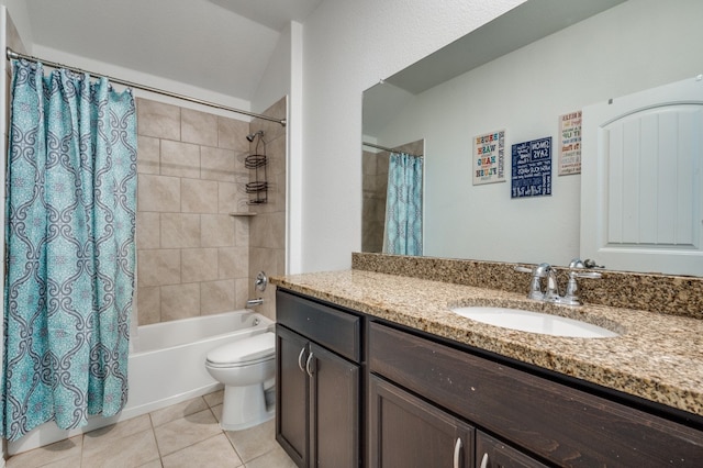 full bathroom with shower / tub combo, tile patterned floors, vanity, and toilet