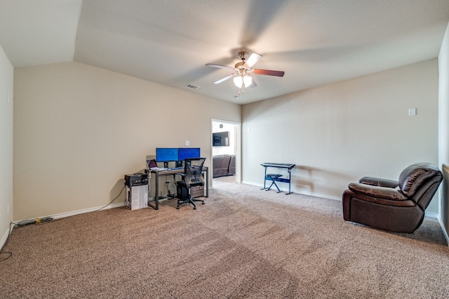 home office featuring carpet flooring, vaulted ceiling, and ceiling fan