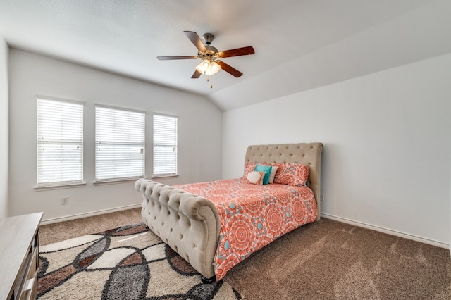 carpeted bedroom featuring lofted ceiling and ceiling fan