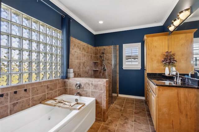 bathroom featuring a wealth of natural light, ornamental molding, and shower with separate bathtub