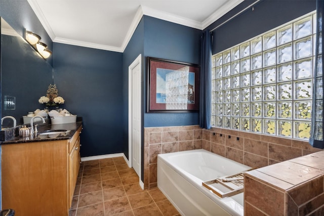 bathroom featuring tile patterned flooring, vanity, ornamental molding, and a bath