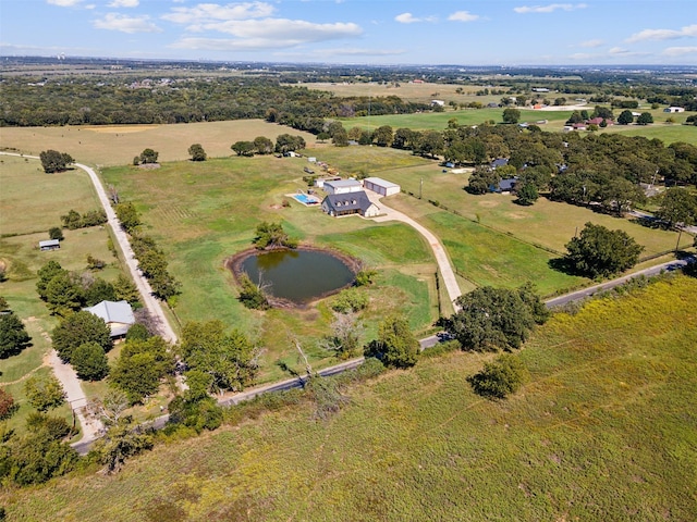 aerial view featuring a rural view and a water view